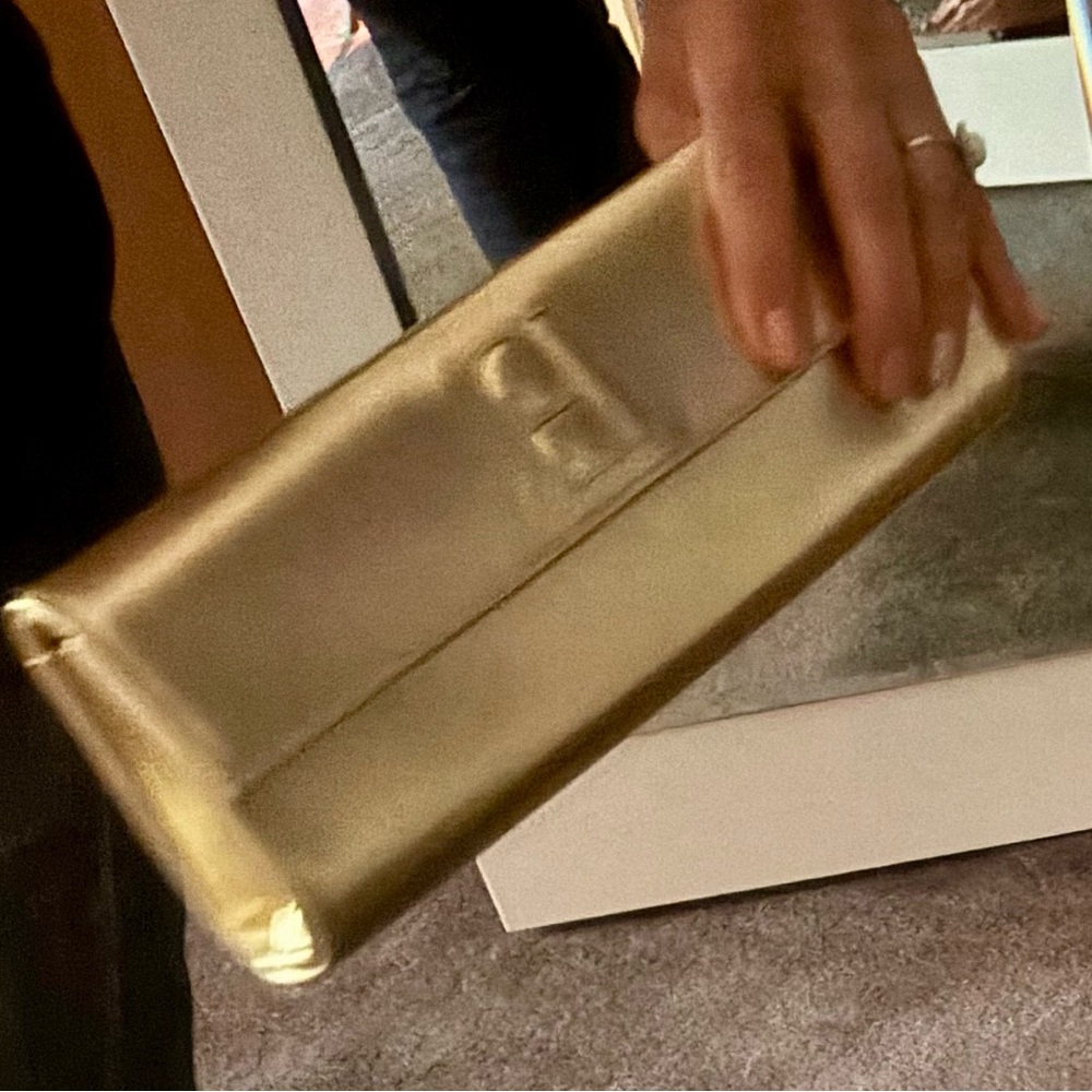 Elegant Gold Clutch designed by Lisa Perry